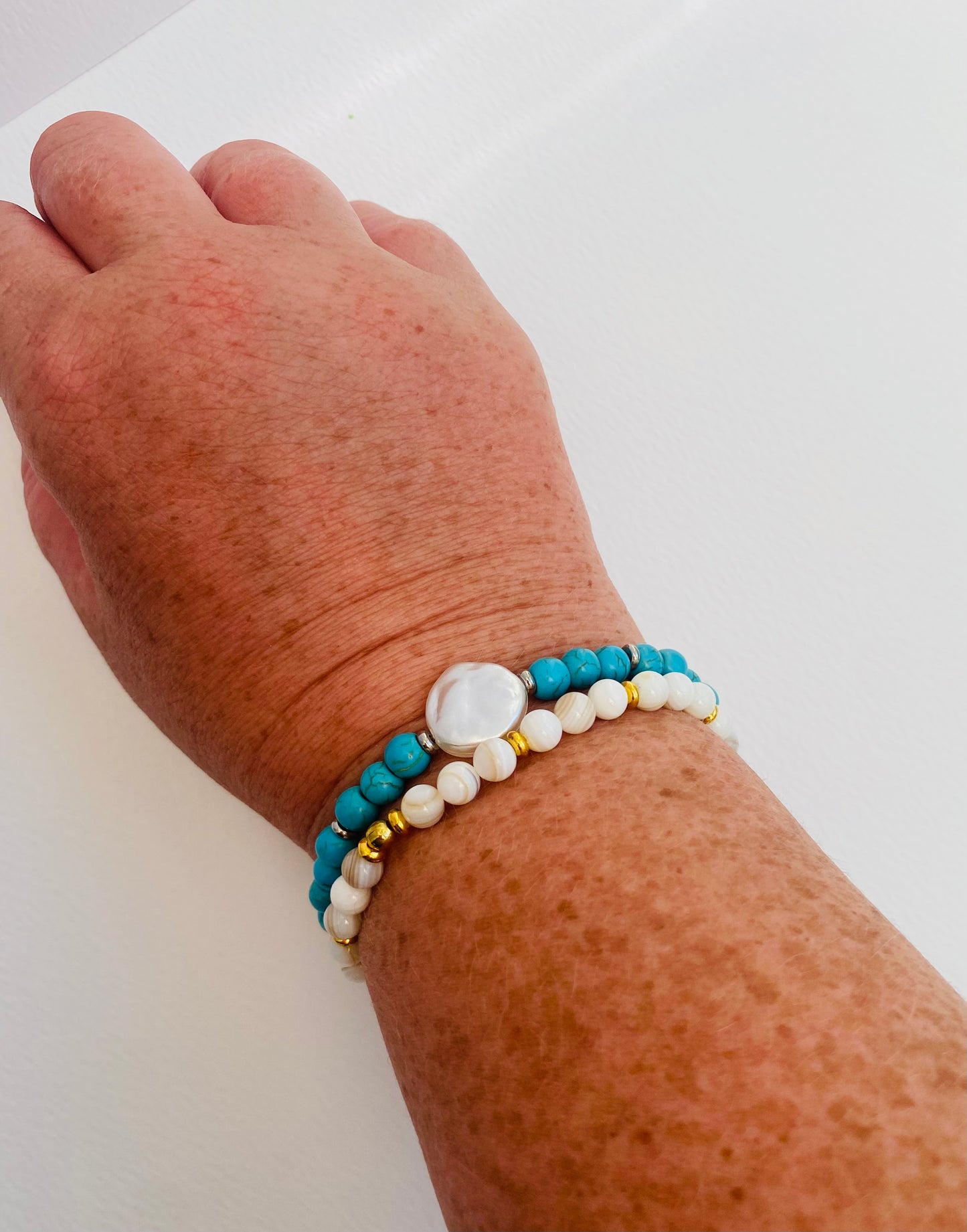 White shell beaded bracelets